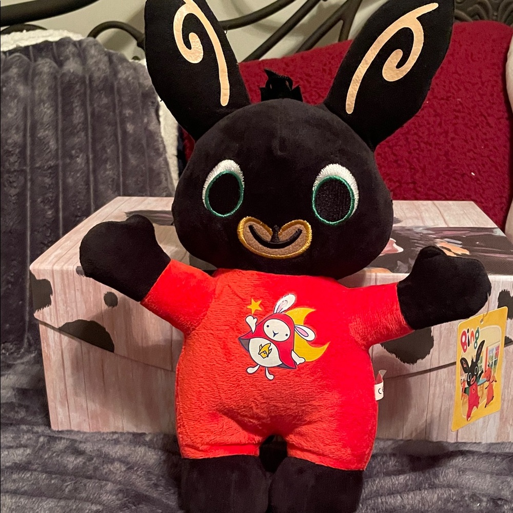 Adorable Black and Red Stuffed Animal